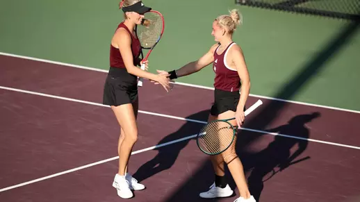 Daria Smetannikov and Lexington Reed celebrating a point.