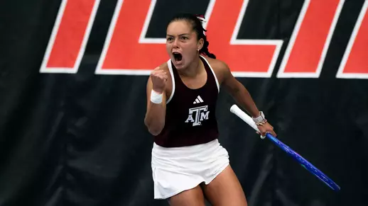 Lucciana Perez celebrates a singles win against Oklahoma