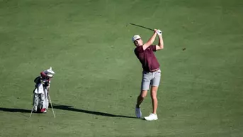 Wheaton Ennis admires a shot at Southern Highlands Golf Club