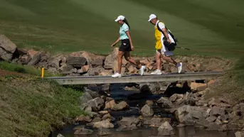Vanessa Borovilos of Canada walks across the bridge on the No. 15 hole during the second round of the Augusta National Women's Amateur at Champions Retreat Golf Club, Thursday, April 02, 2026.