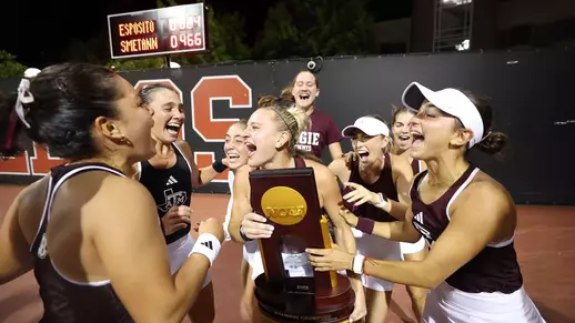 Women's TEnnis with the national championship trophy
