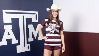 Norah Bell poses during her recruiting trip portrait shoot.