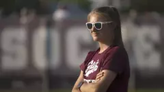 Ashley Herndon surveys the field at Montana