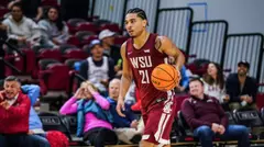Ace Glass brings the ball up the court against LMU, Feb. 25, 2026