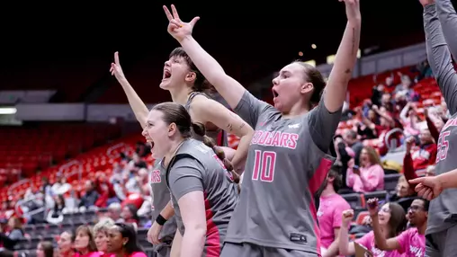 26_2_26 WSU WBB Bench celebrates a bucket against Seattle U