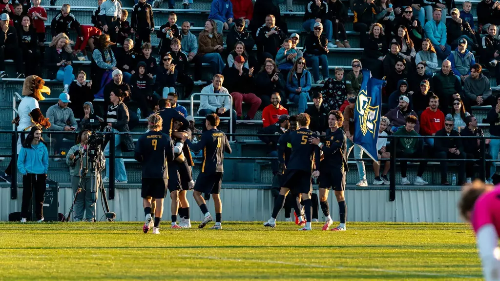 men's soccer celebration