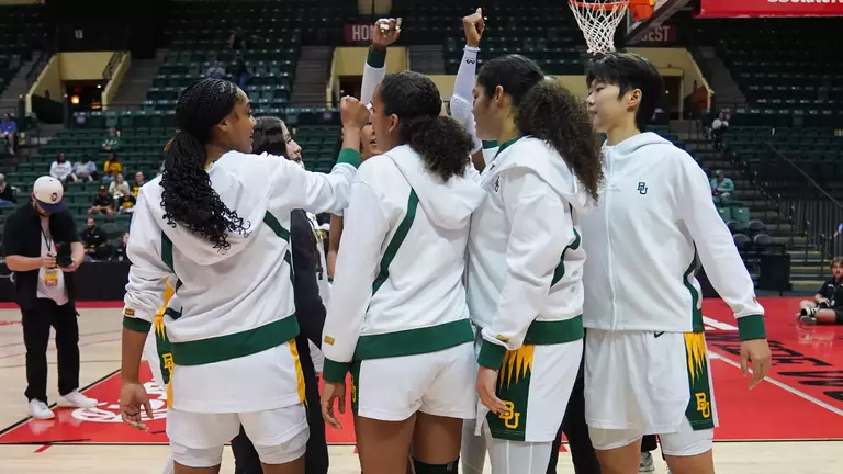 Team Huddles pregame vs Iowa in WBCA Showcase