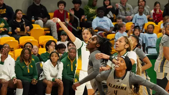 Taliah Scott shoots in traffic vs Alabama St.