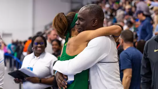 Alexis Brown & Coach Ford hugging