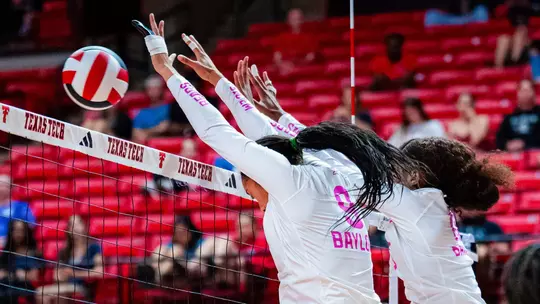 Mya Hemmer and Nadiya Johnson Combine on a Block against Texas Tech in 2026