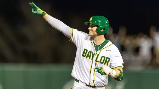 Tyce Armstrong waving while rounding the bases 2026