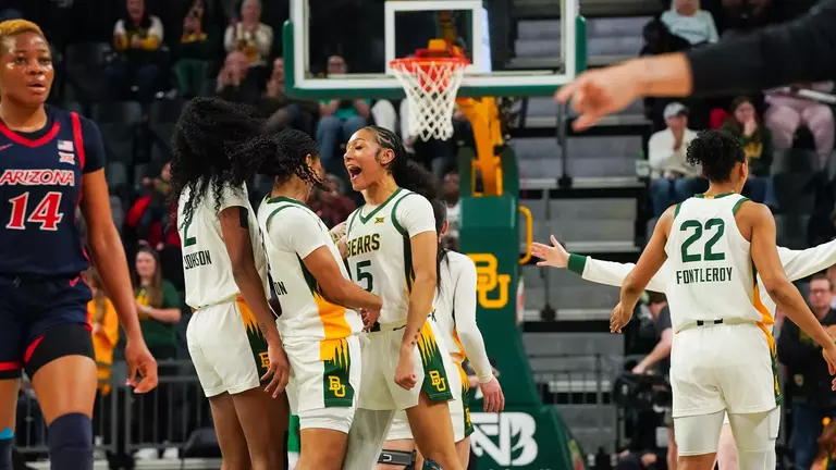 Darianna Littlepage-Buggs celebrates with team vs Arizona