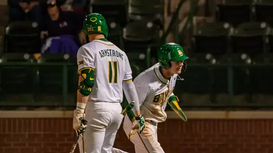 Brady Janusek and Tyce Armstrong high five 2026