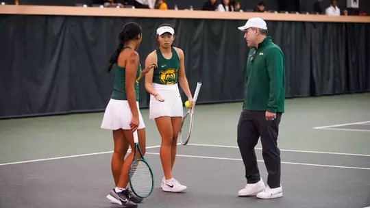 Joey Scrivano coaches Mu-Jie and Gabby in doubles vs SMU
