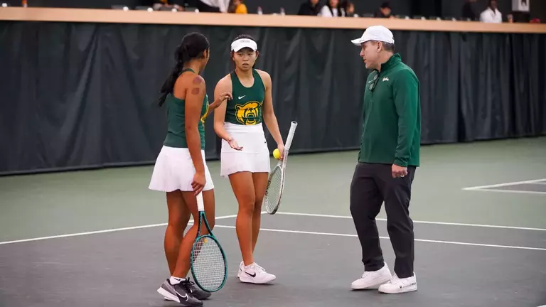 Joey Scrivano coaches Mu-Jie and Gabby in doubles vs SMU