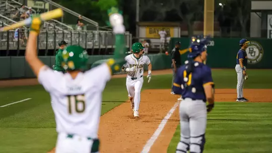 Travis Sanders scoring against West Virginia 2026
