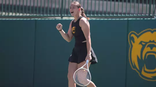 Alian Zack celebrating in doubles versus KU