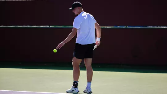 Devin Badenhorst getting ready to serve