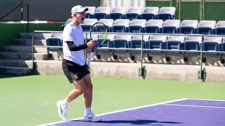 Louis Bowden fist pumps and yells