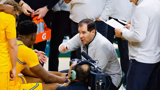 Head coach Scott Drew coaching at a timeout