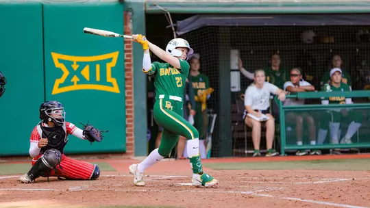 Faith Piper gets a hit against Lamar