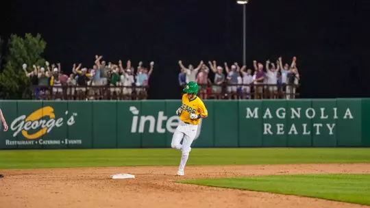 Pearson Riebock rounds second base after hitting a home run against TCU 2026
