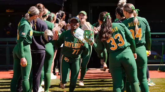 Sa'Mya Jones runs out of the tunnel against Utah
