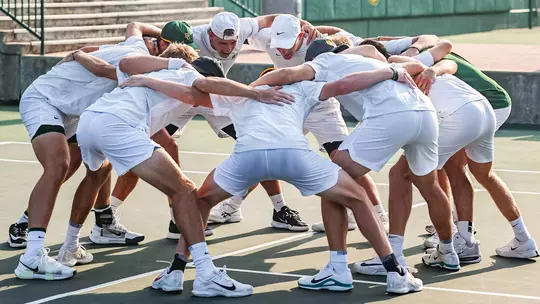 MT Team Huddle Sic Em before Utah