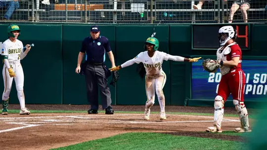 Brooklyn Carter Slides in Safely against Wisconsin in the NCAA AUstin Regional