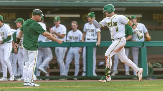 Tyce Armstrong high fiving Jim Blair