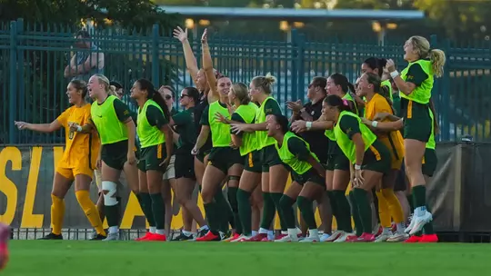 Soccer bench celebrates goal vs Texas A&M 2026