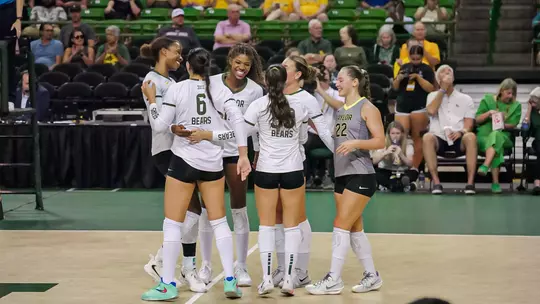 Baylor Celebrates a Point in Match against UIW