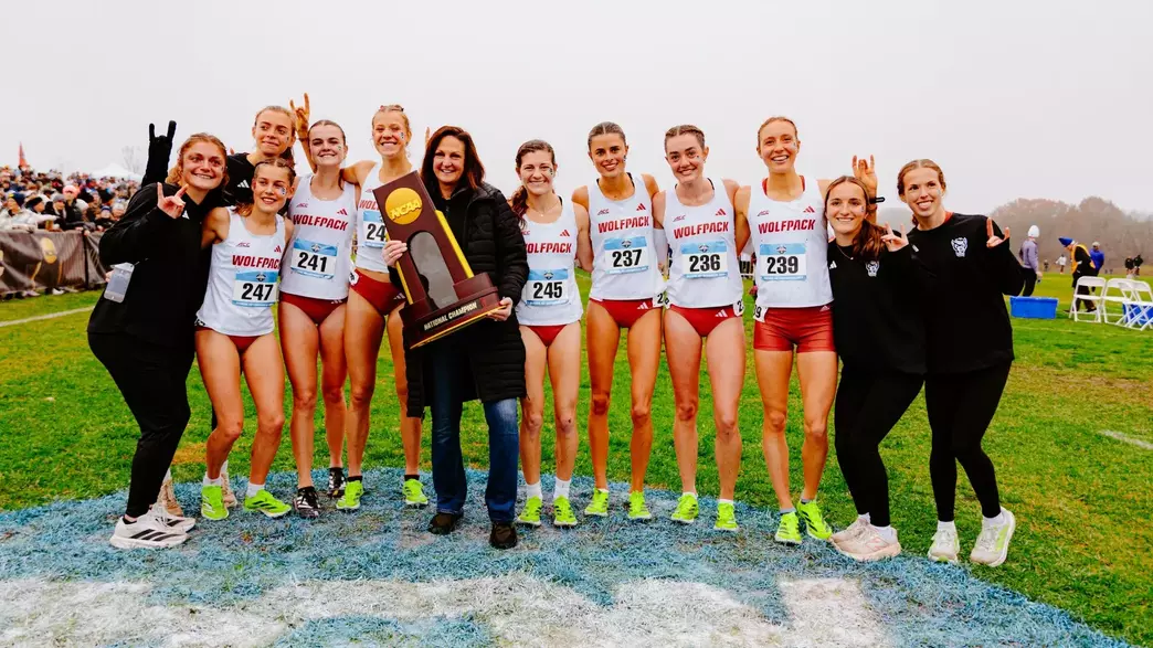 XC Women With NCAA Championship Trophy