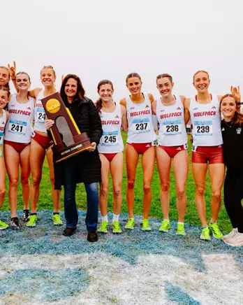 XC Women With NCAA Championship Trophy