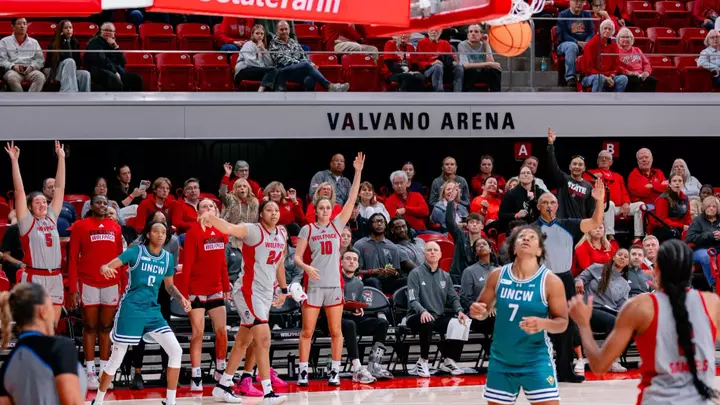 Bench cheers for Kamora Pruitt's 3-pointer