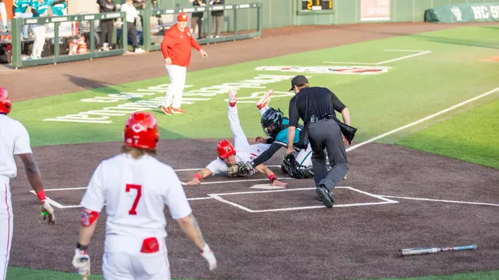 Chris McHugh Sliding home