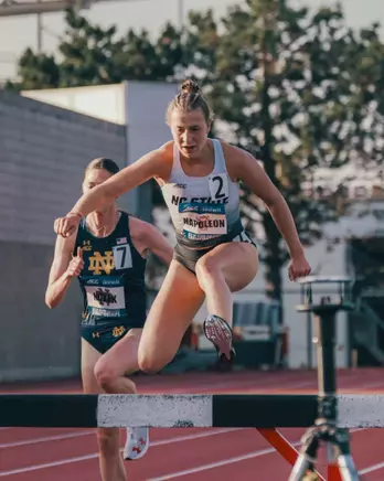 Angelina jumping over a steeple during the 2025 ACC Outdoor Championships