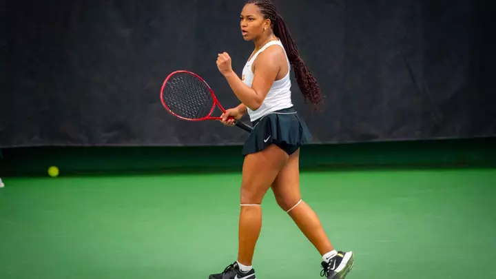 Ariana Anazagasty-Pursoo celebrates after a point on the tennis court
