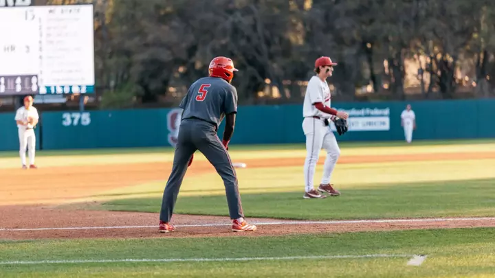 Sherman Johnson leading off third base