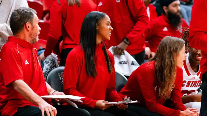 Brittany Morris coaches from sidelines during the 2023-24 season for NC State women's basketball
