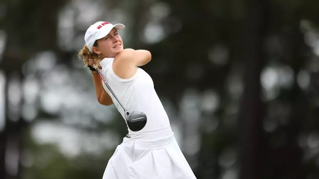 Marie Eline Madsen swings at the Cougar Classic