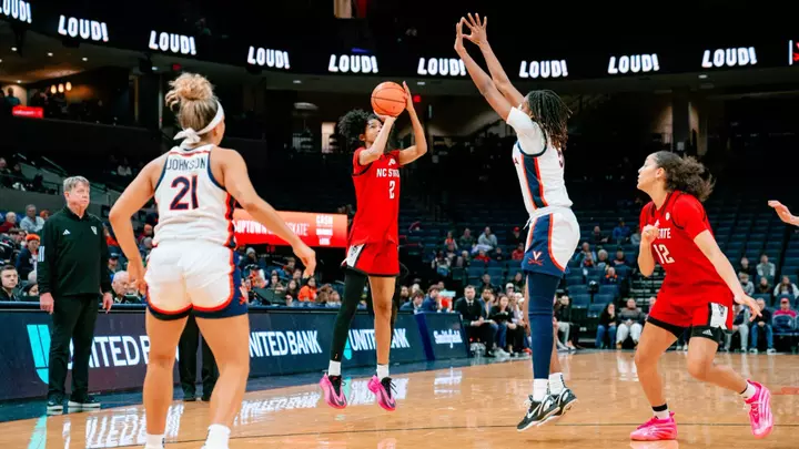 Qadence Samuels of the NC State women's basketball team shoots a 3-pointer vs. Virginia on Jan. 24