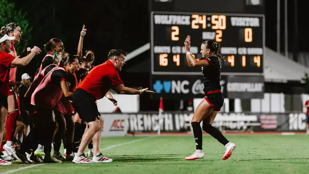 Erica Roberts and Gary Higgins Celebrate vs. Elon
