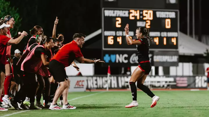 Erica Roberts and Gary Higgins Celebrate vs. Elon