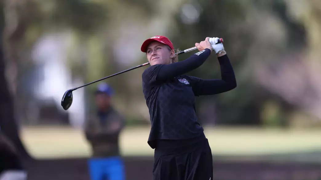 Marie Madsen swings at the Landfall Tradition