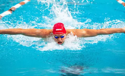 Torok breaks own school record in 200 fly