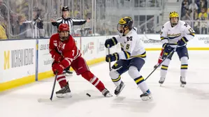 No. 10/9 Wisconsin suffers first setback of season at No. 2 Michigan