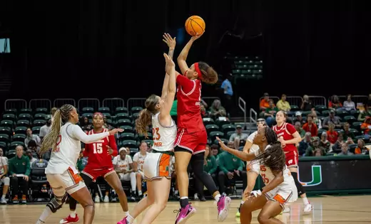 Wisconsin surges past Miami 72-65