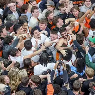 Player mid storming the court