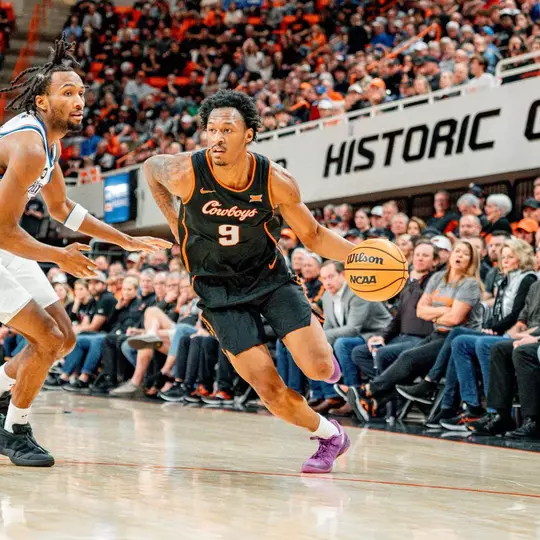 Anthony Roy drives to the basket during a 2026 game against Kansas in Gallagher-Iba Arena